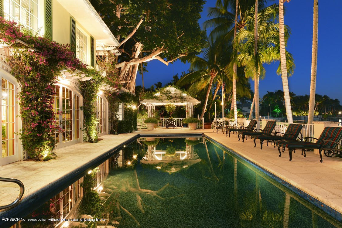 400 Caribbean Road Palm Beach, FL 33480 - Photo 41 of 45 a view of swimming pool with chairs