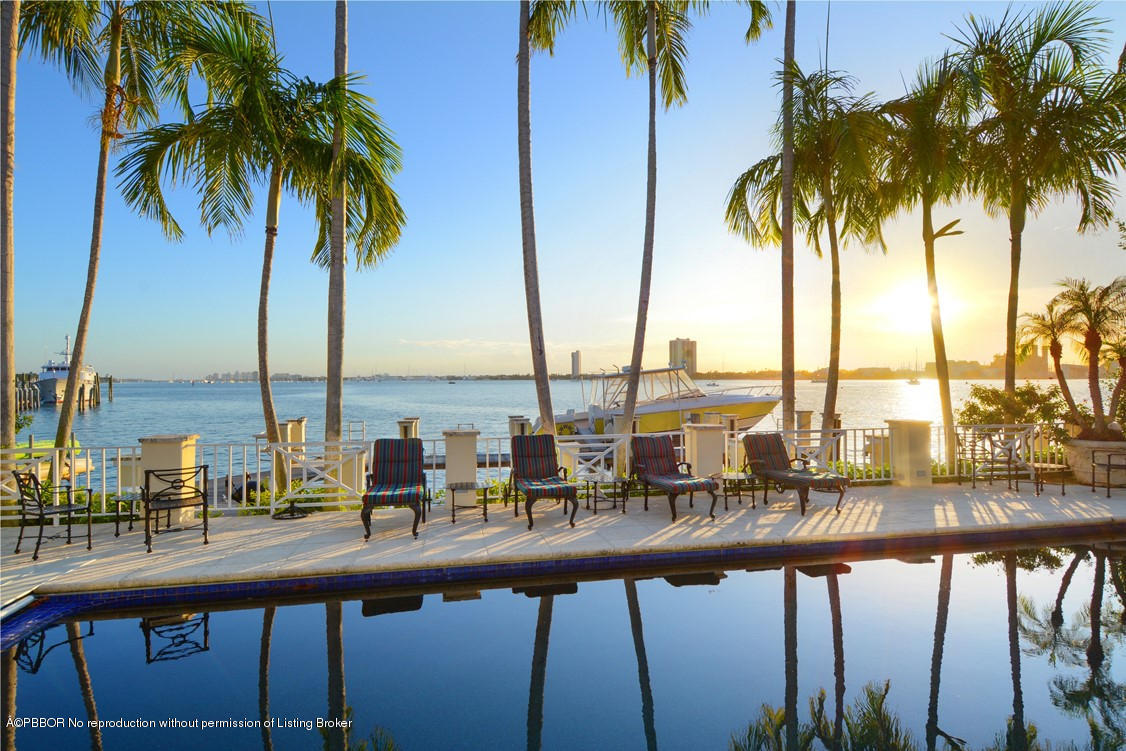 400 Caribbean Road Palm Beach, FL 33480 - Photo 43 of 45 a view of ocean with a palm tree