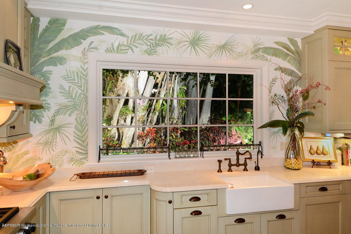 400 Caribbean Road Palm Beach, FL 33480 - Photo 6 of 45 a bathroom with a sink and a large mirror