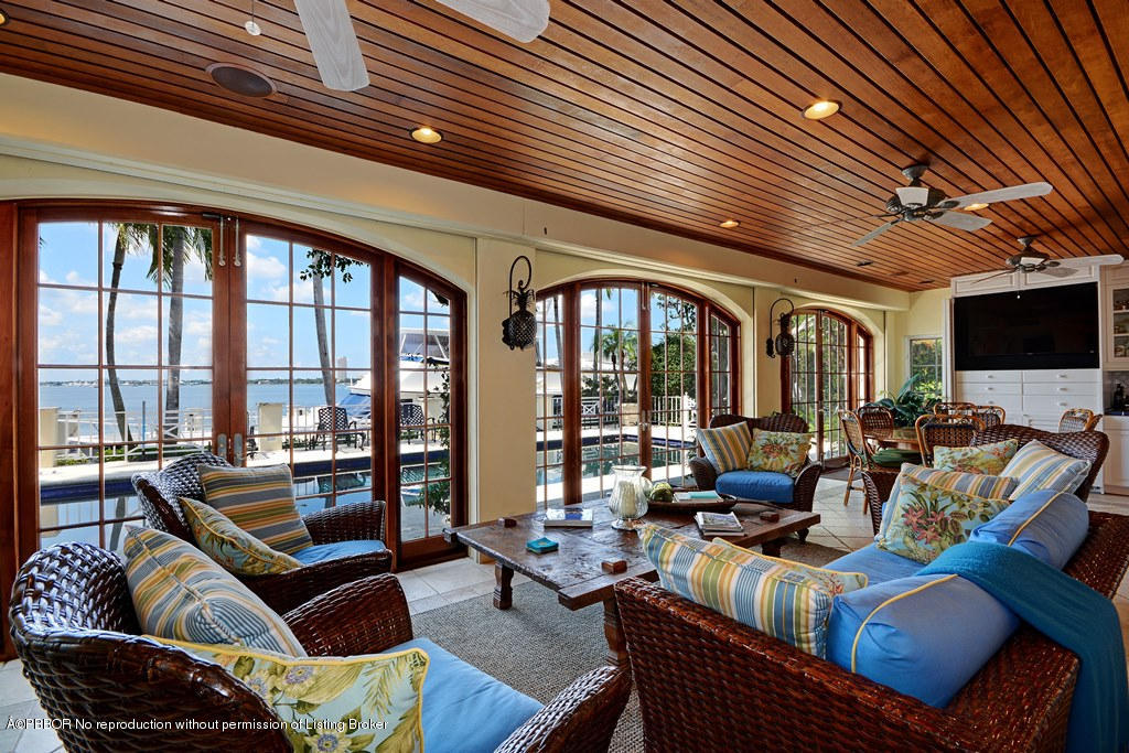 400 Caribbean Road Palm Beach, FL 33480 - Photo 10 of 45 a living room with furniture or outdoor view and a potted plant