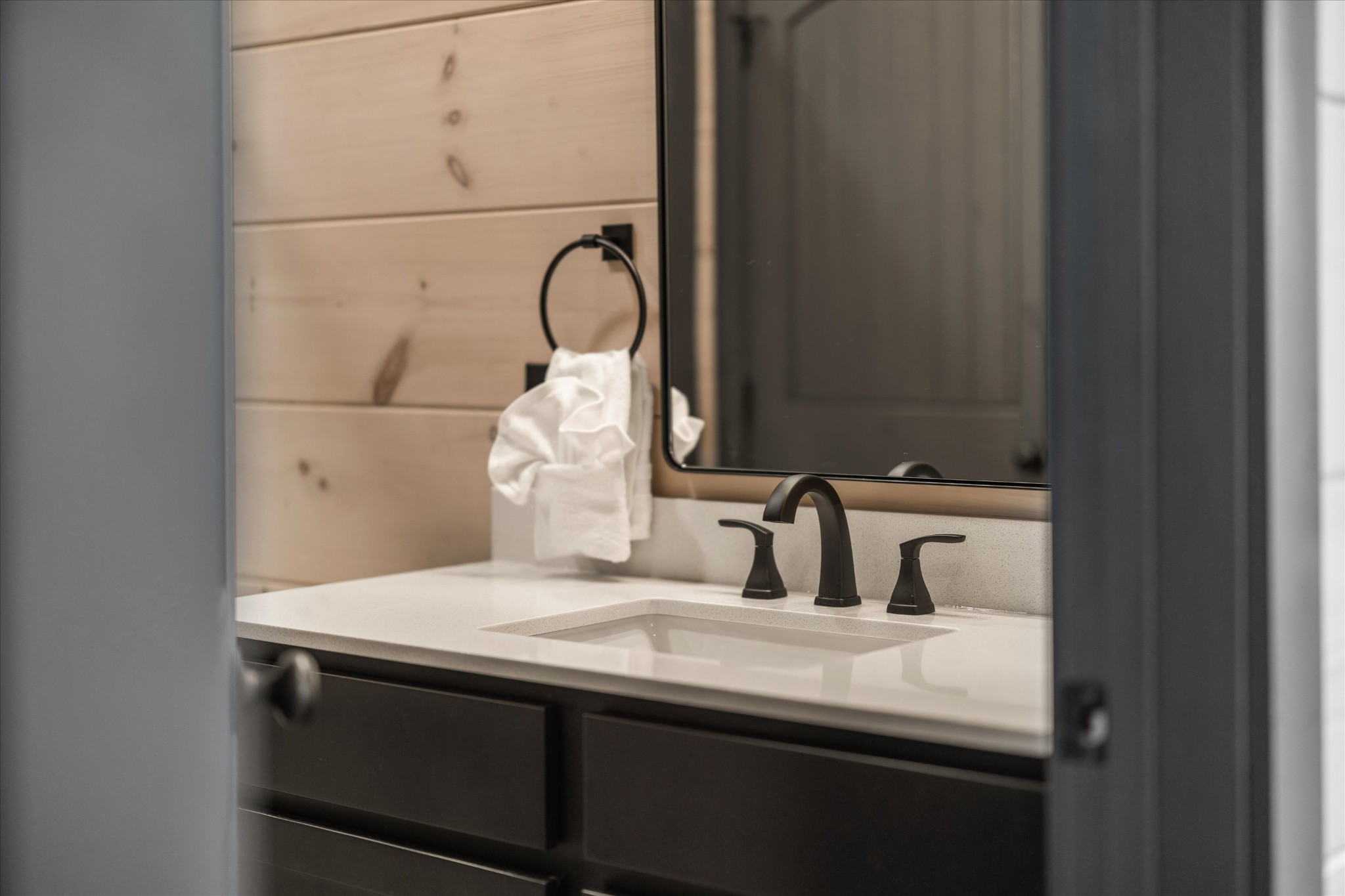 297 Rambling Crk Way Sevierville, TN 37862 - Photo 33 of 84 a bathroom with a sink and a mirror