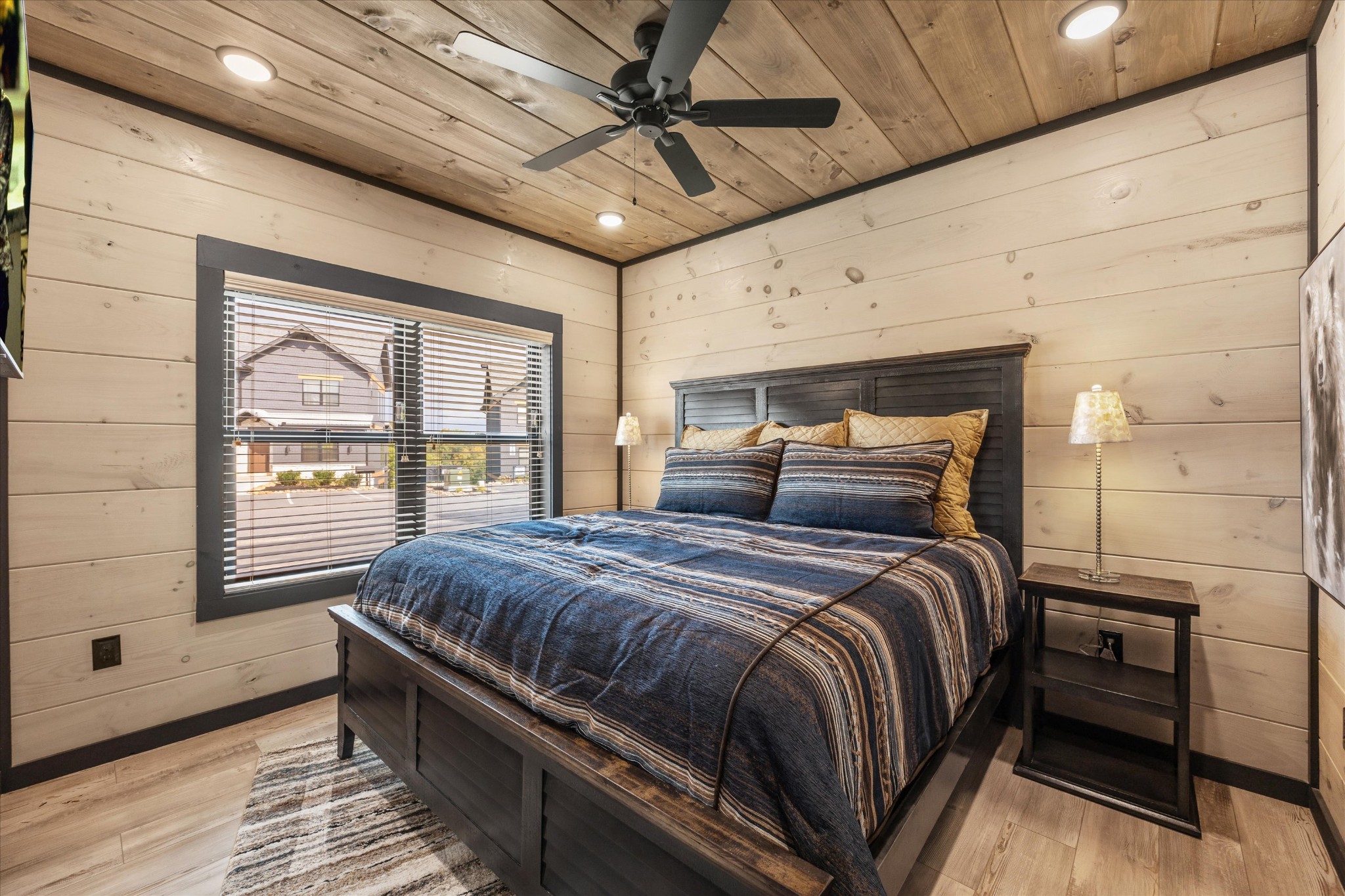 297 Rambling Crk Way Sevierville, TN 37862 - Photo 35 of 84 a bed sitting in a spacious bedroom next to a window