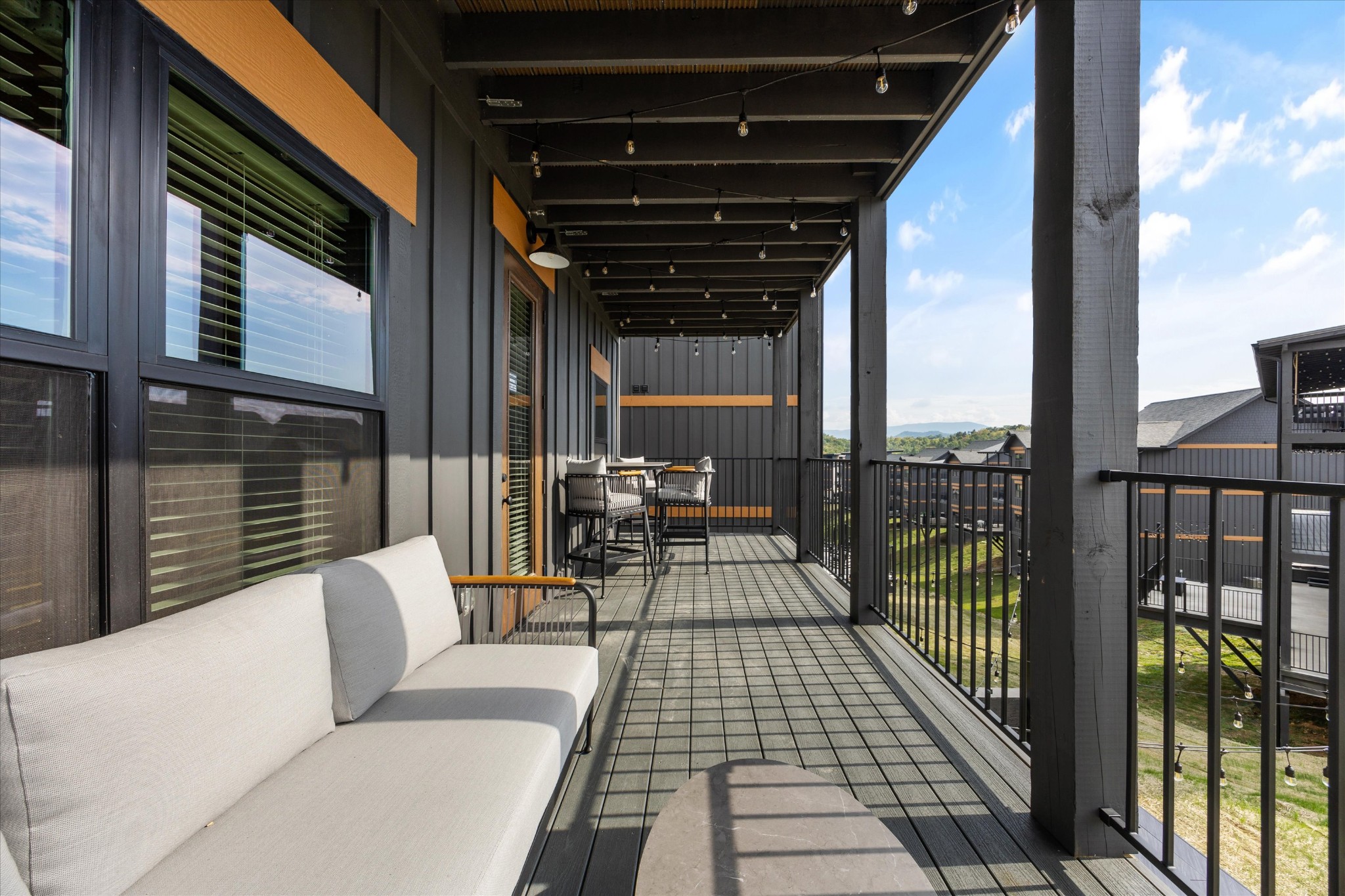 297 Rambling Crk Way Sevierville, TN 37862 - Photo 36 of 84 a view of a balcony with furniture