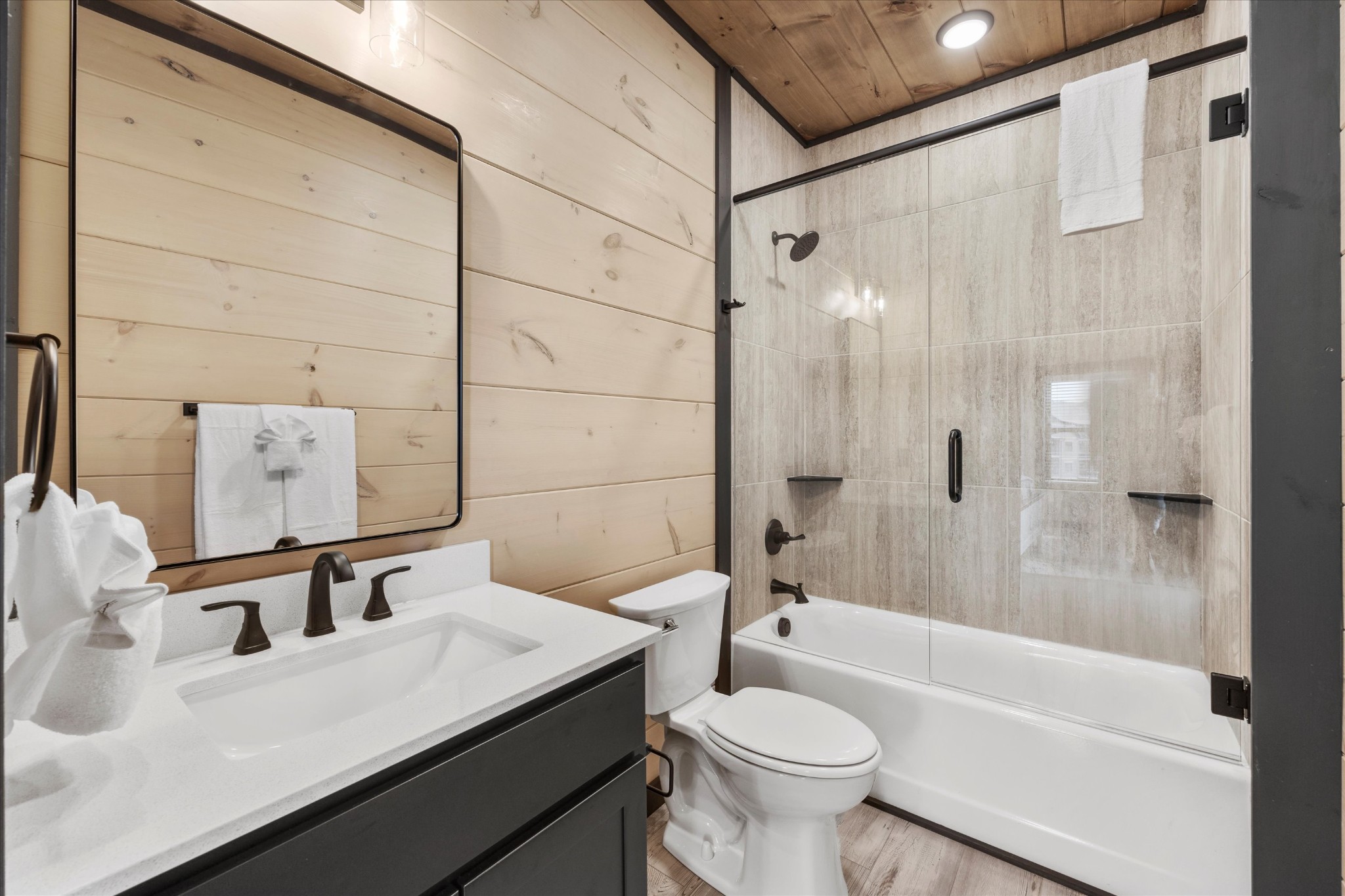 297 Rambling Crk Way Sevierville, TN 37862 - Photo 49 of 84 a bathroom with a sink a toilet and shower