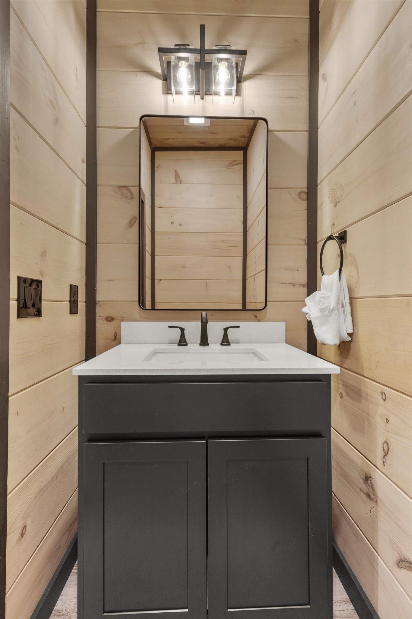 297 Rambling Crk Way Sevierville, TN 37862 - Photo 60 of 84 a bathroom with a sink and a mirror