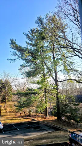 a kitchen with a sink and stainless steel appliances