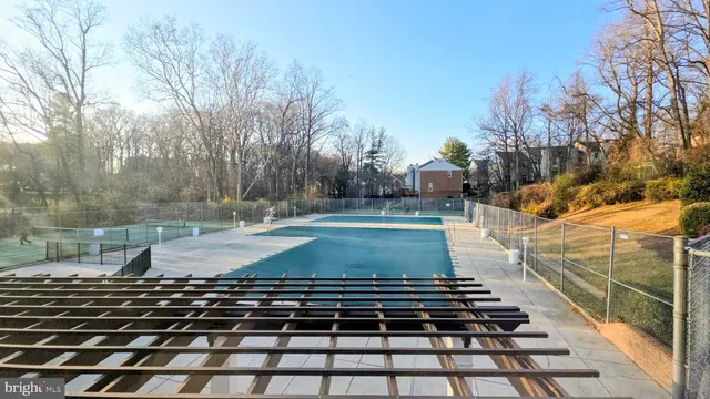 a view of a wrought iron fences in front of house