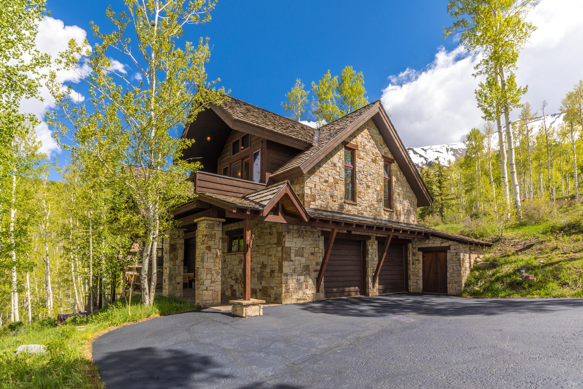 107 Joaquin Road Telluride, CO 81435 - Photo 2 of 7 a front view of a house with a yard