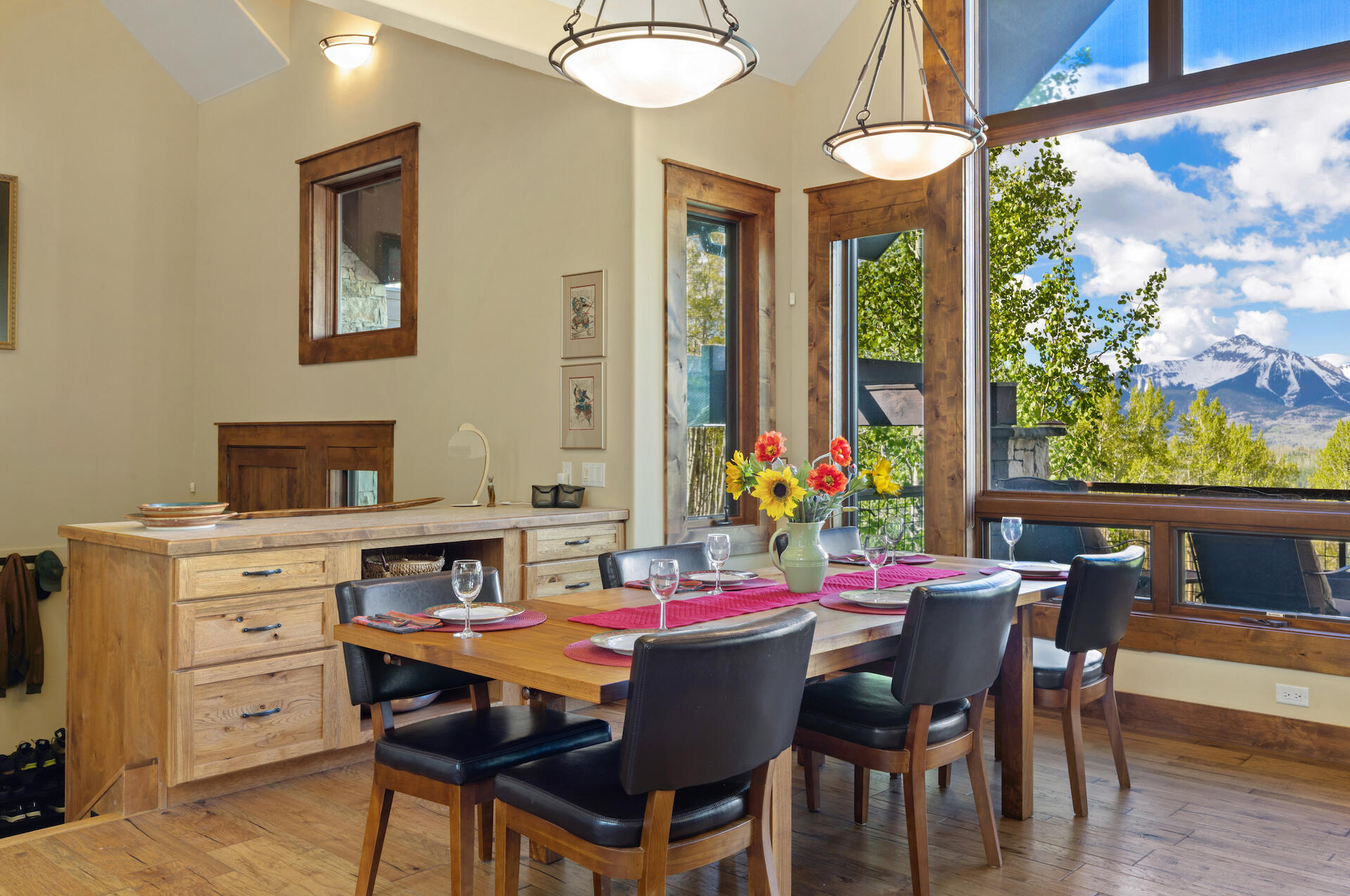 107 Joaquin Road Telluride, CO 81435 - Photo 4 of 7 a view of a dining room with furniture window and outside view