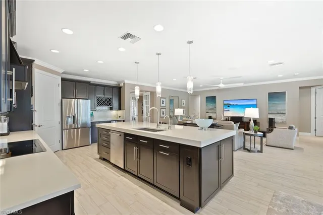 a bed room with a bed a fireplace and a television