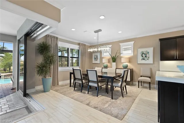 a view of a dining room with furniture window and outside view