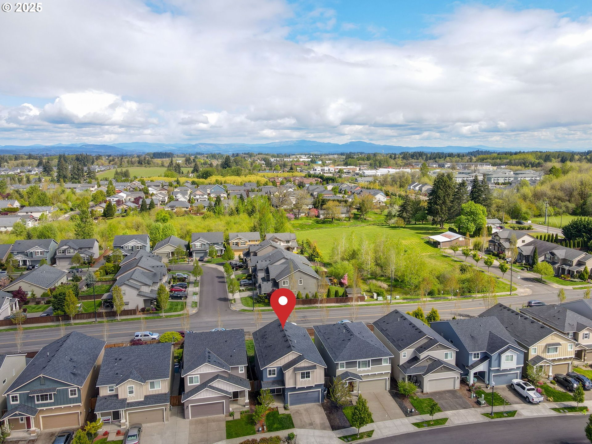 262 North 34th Court Ridgefield, WA 98642 - Photo 26 of 27 an aerial view of residential houses with outdoor space