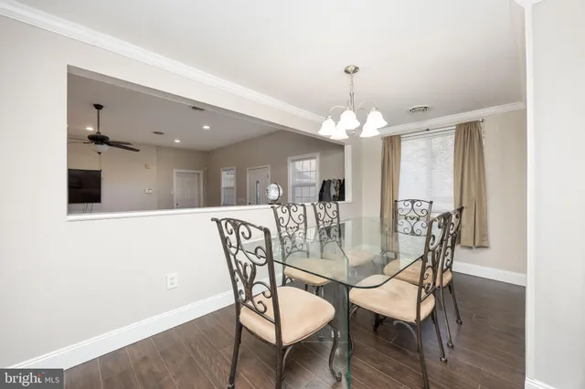 a spacious bedroom with a bed and a couch