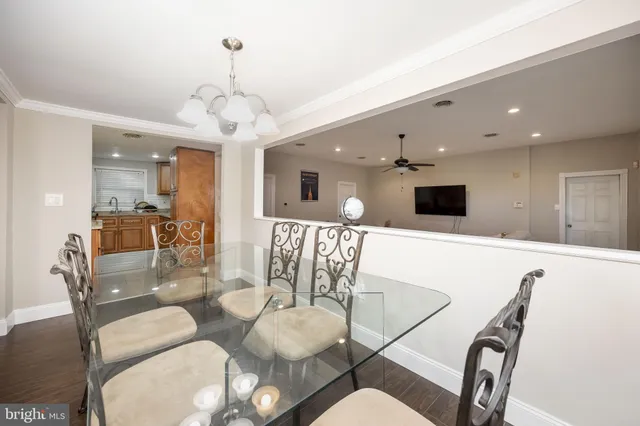 a kitchen with granite countertop sink cabinets and window