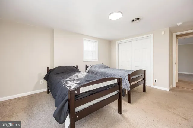 a bathroom with a sink a mirror and shower