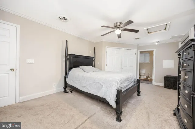 a bathroom with a shower sink and mirror