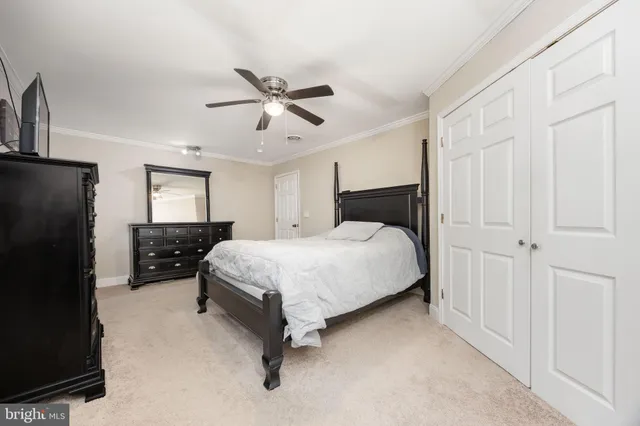 a white bath tub sitting next to a white sink