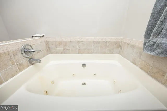 a view of a house with wooden deck