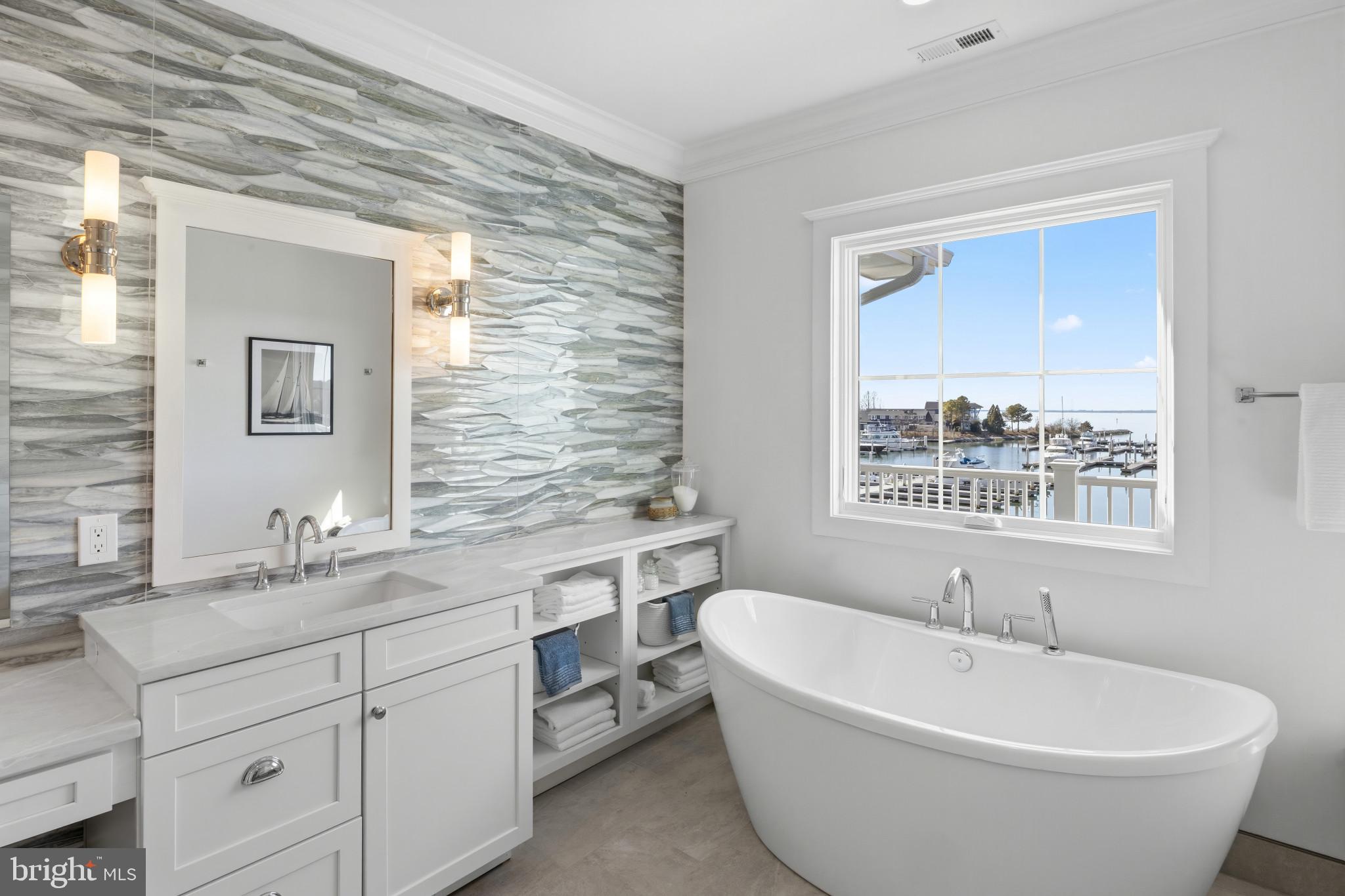 119 Petrie Way Stevensville, MD 21666 - Photo 22 of 45 a spacious bathroom with a bathtub and 2 sink