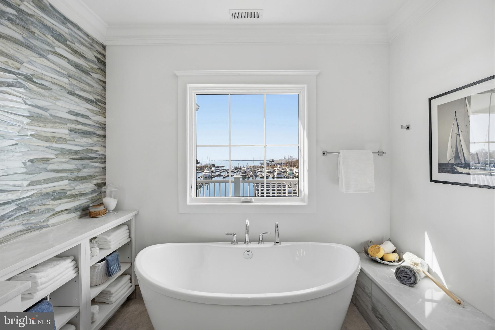 119 Petrie Way Stevensville, MD 21666 - Photo 23 of 45 a white bath tub sitting next to a white sink
