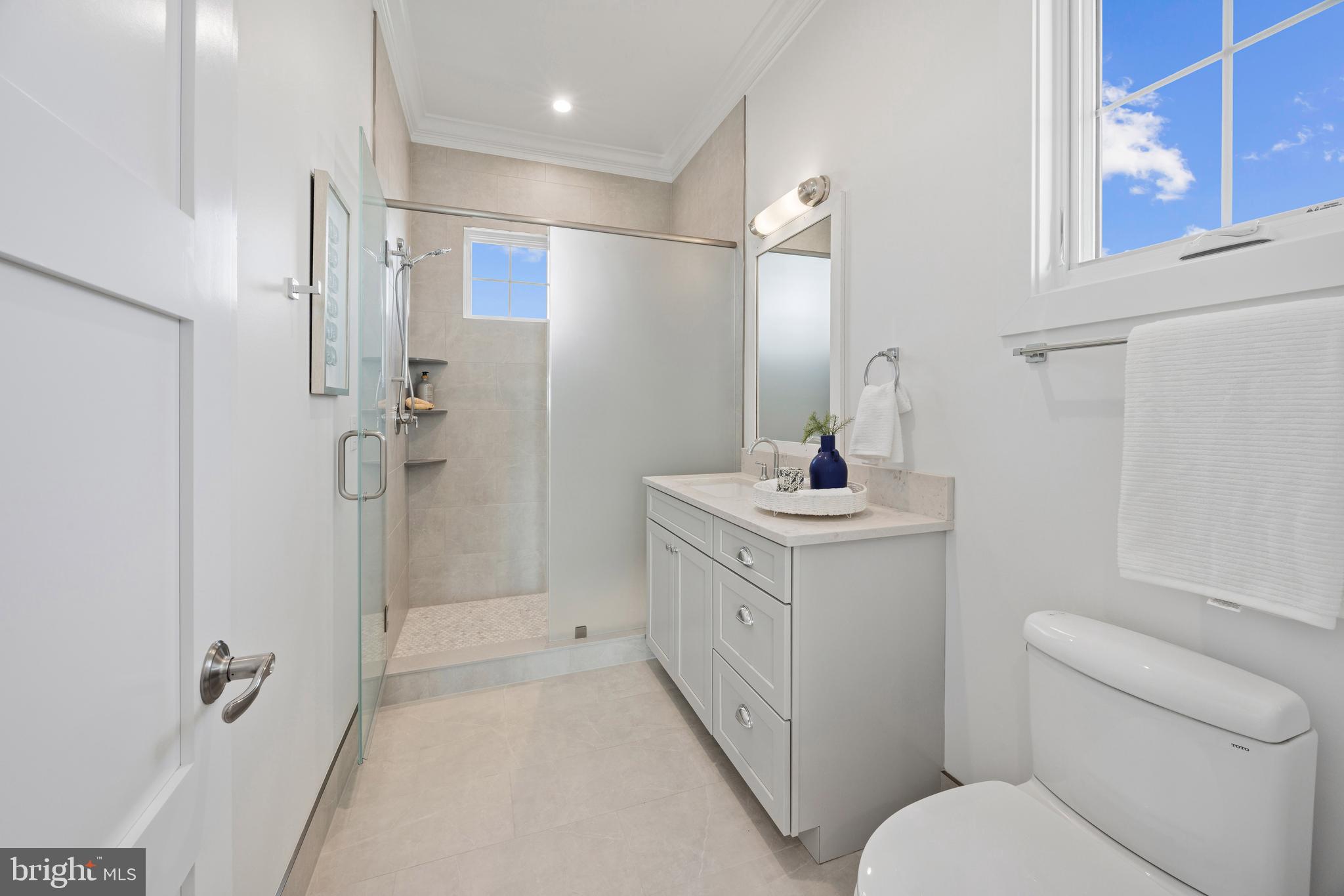 119 Petrie Way Stevensville, MD 21666 - Photo 26 of 45 a bathroom with a toilet sink and shower