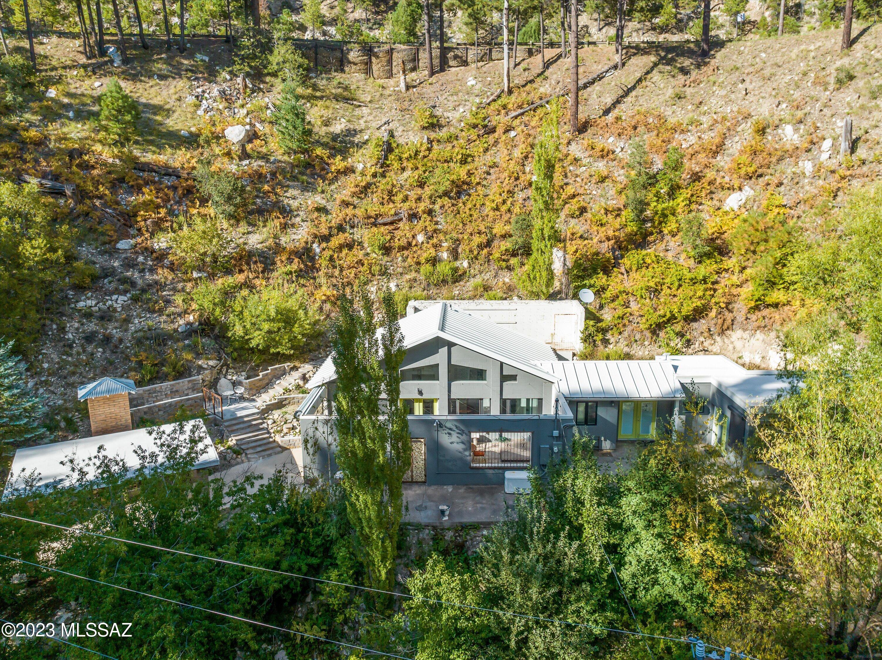 11021 East Turkey Run Road Mount Lemmon, AZ 85619 - Photo 48 of 50 a view of a house with a yard