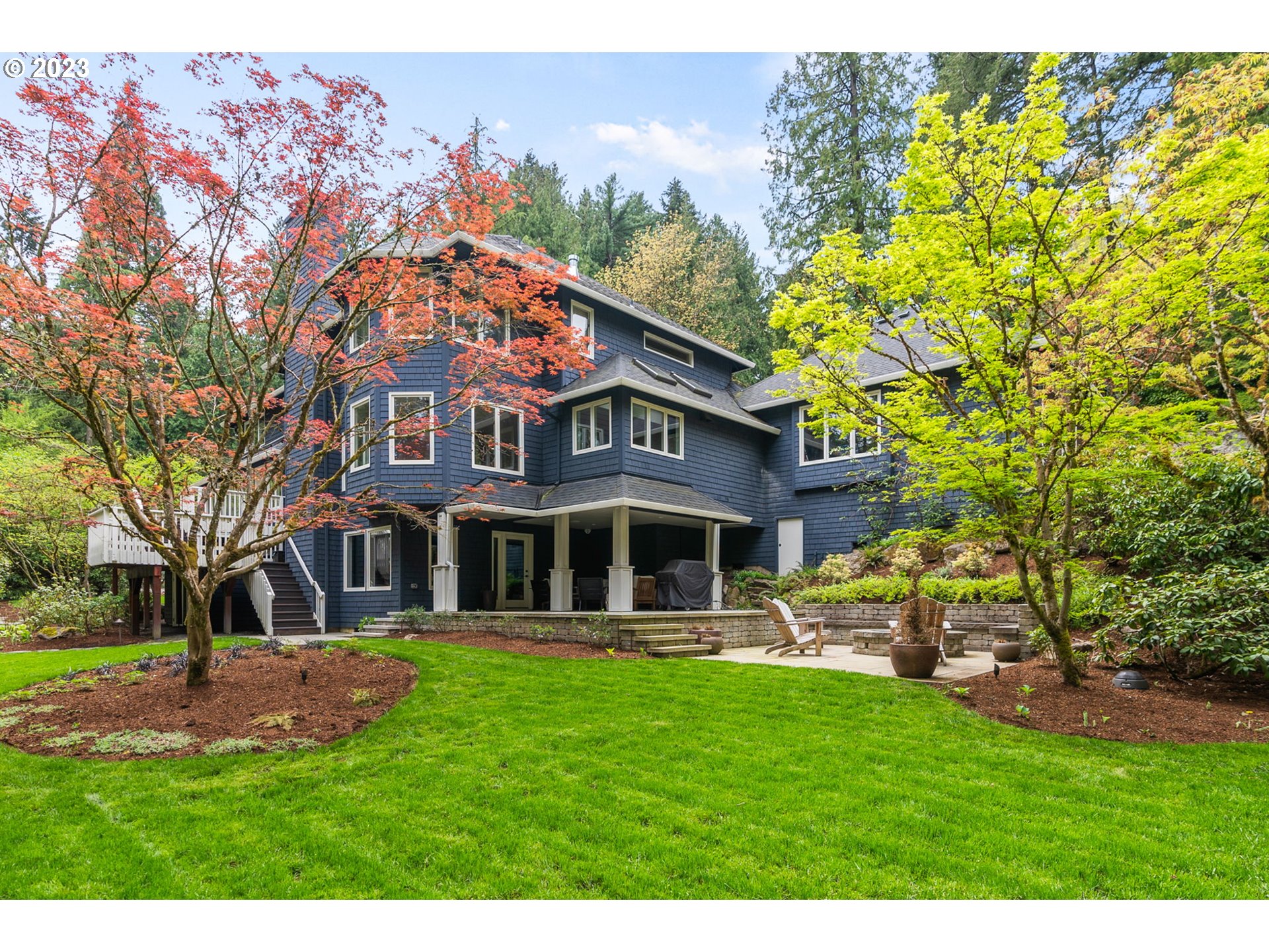 1991 South Palatine Hill Road Portland, OR 97219 - Photo 1 of 48 a front view of a house with garden