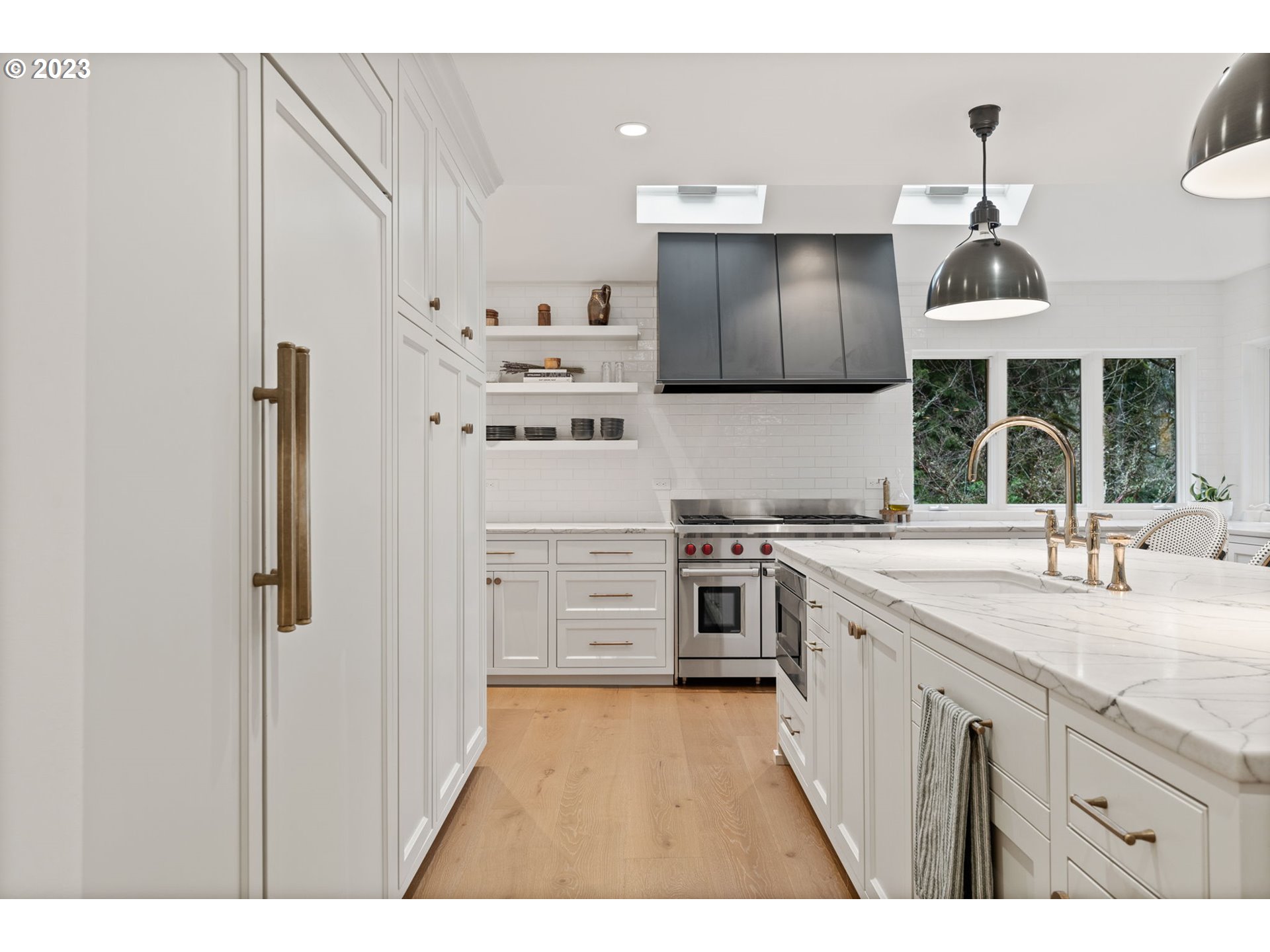1991 South Palatine Hill Road Portland, OR 97219 - Photo 12 of 48 a kitchen with stainless steel appliances a sink stove and refrigerator