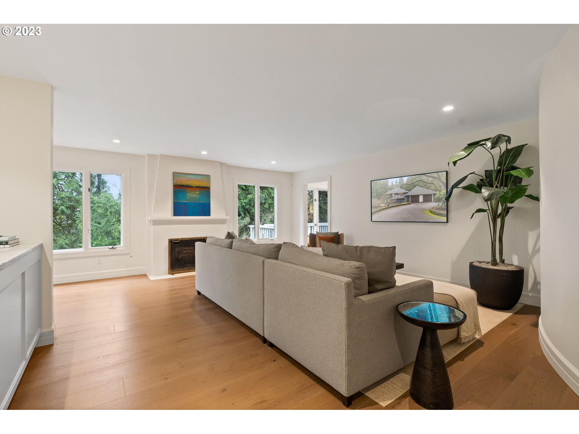 1991 South Palatine Hill Road Portland, OR 97219 - Photo 16 of 48 a living room with furniture and a potted plant