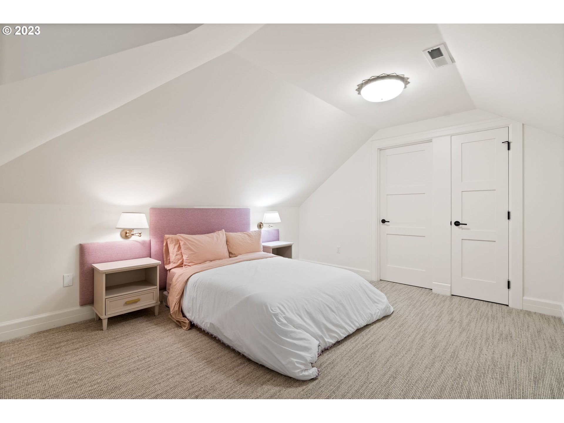 1991 South Palatine Hill Road Portland, OR 97219 - Photo 32 of 48 a bedroom with a bed and a night stand