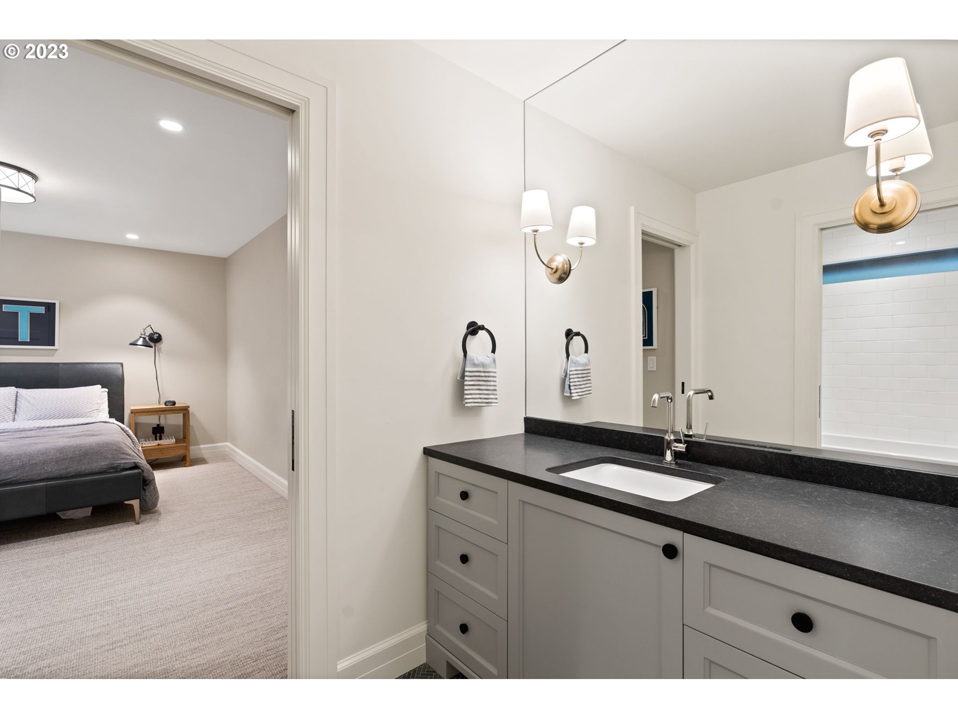 1991 South Palatine Hill Road Portland, OR 97219 - Photo 36 of 48 a en suite bathroom with a sink and a mirror