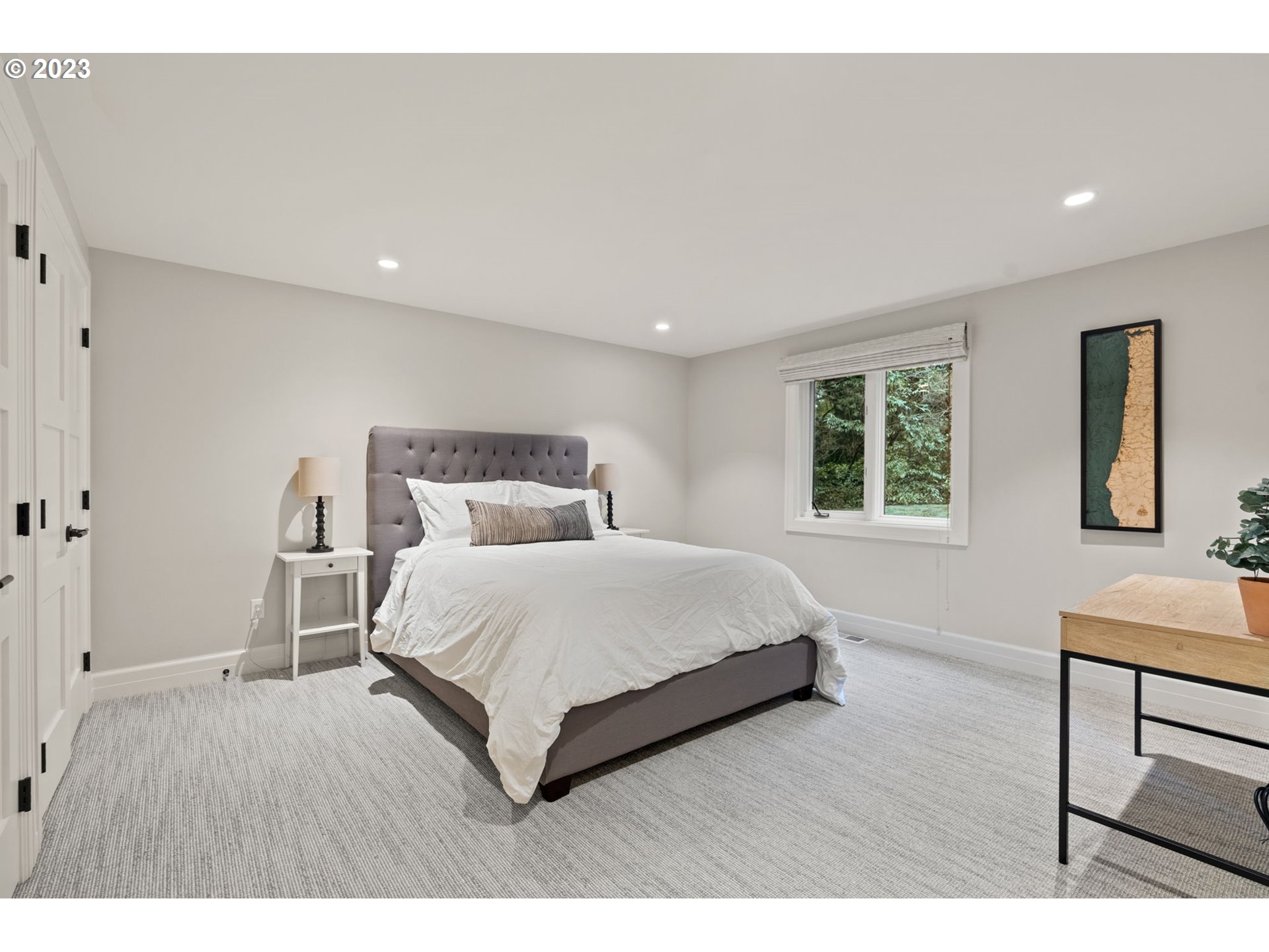 1991 South Palatine Hill Road Portland, OR 97219 - Photo 41 of 48 a bedroom with a bed a table and painting