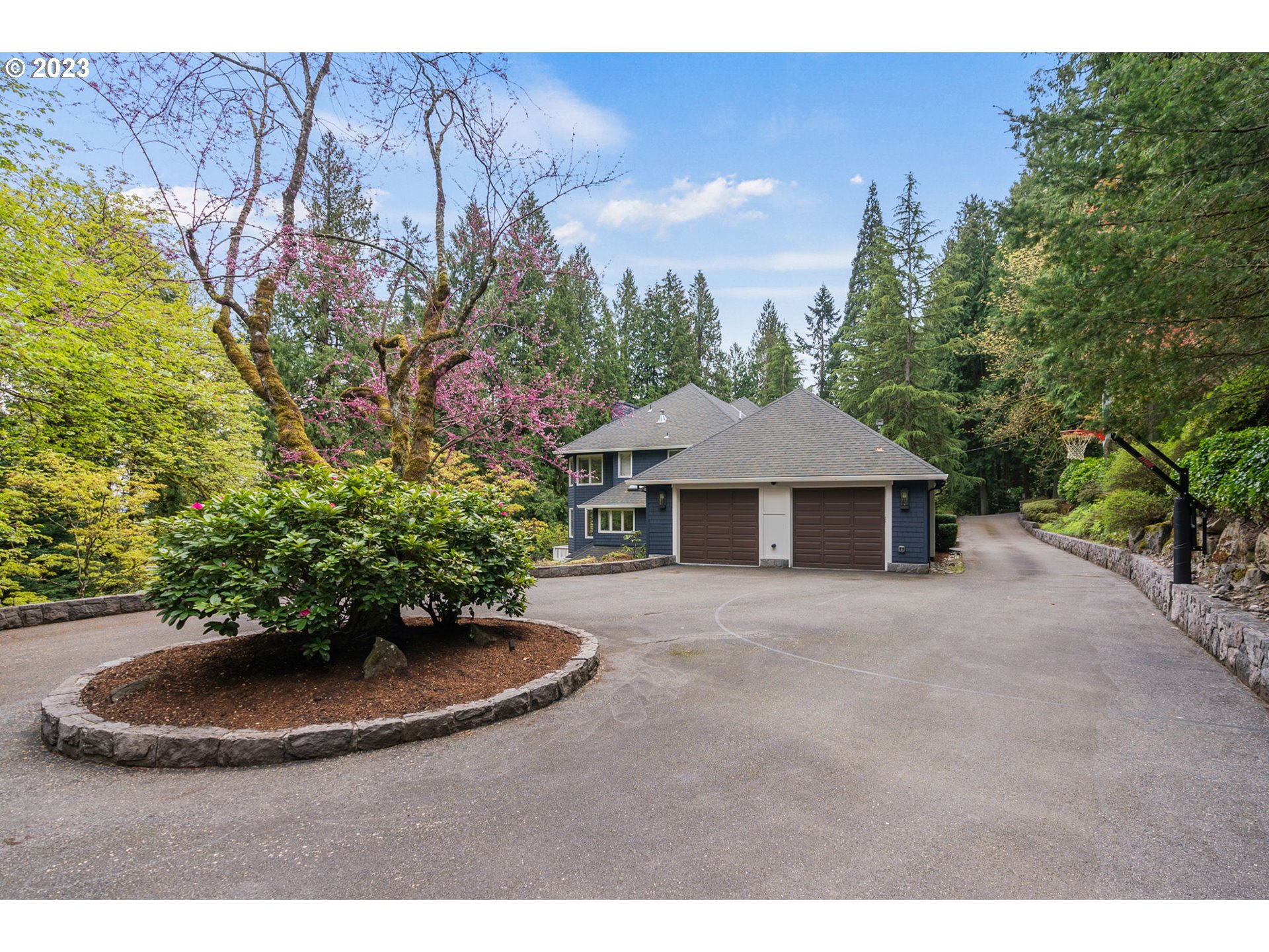 1991 South Palatine Hill Road Portland, OR 97219 - Photo 46 of 48 a view of a house with a yard and potted plants
