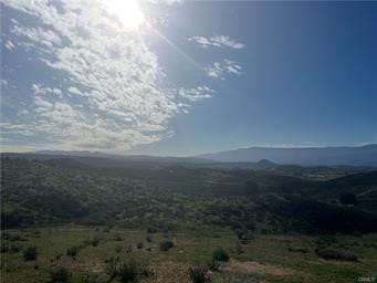 38497 Trifone Road Hemet, CA 92544 - Photo 4 of 6 a view of a field of mountains and mountain view in back