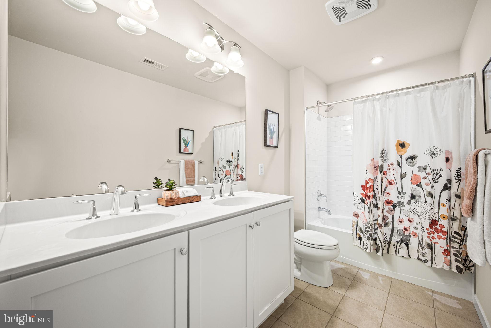 176 Kennedy Drive Media, PA 19063 - Photo 24 of 46 Hall bathroom with dual sink vanity