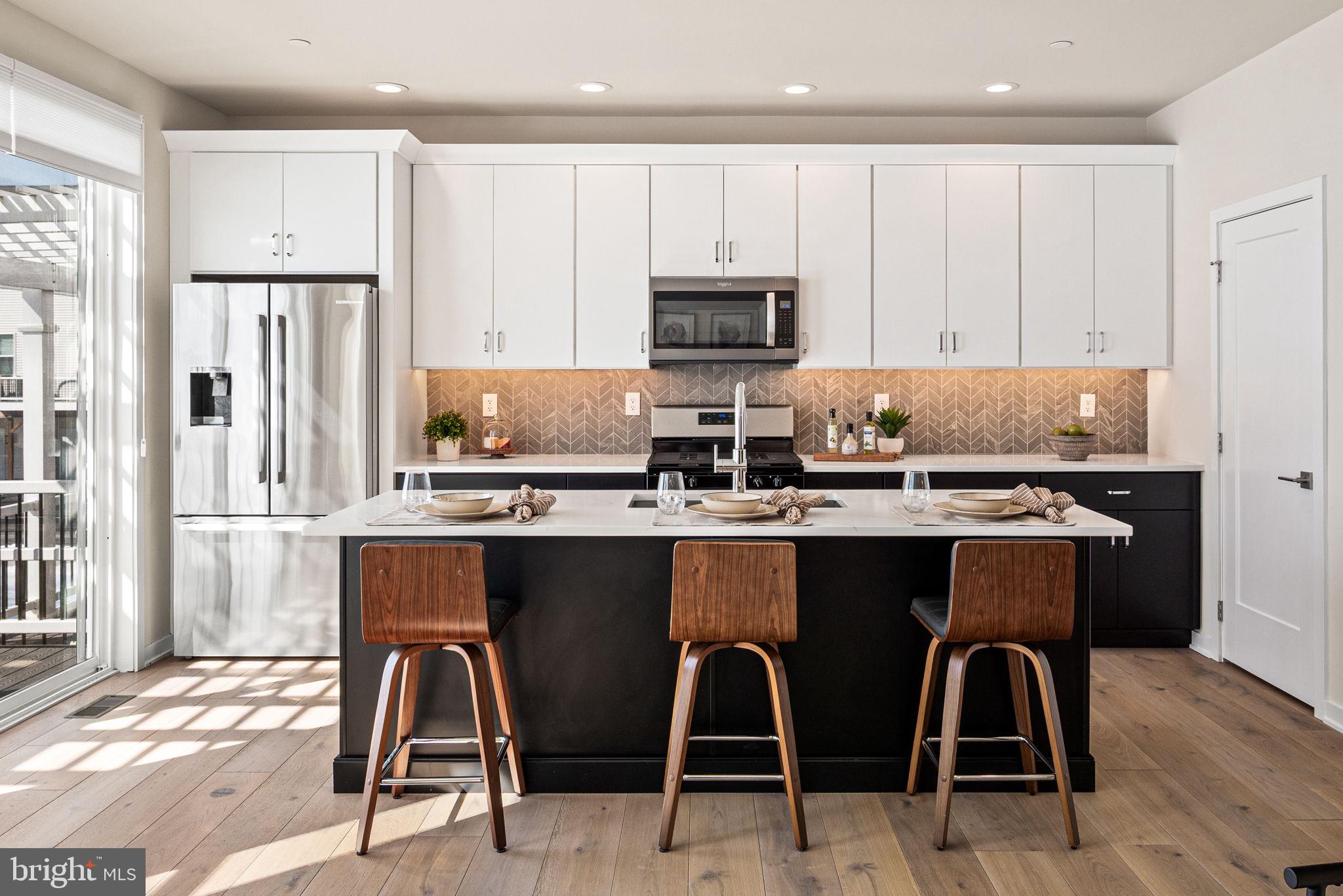 176 Kennedy Drive Media, PA 19063 - Photo 7 of 46 Upgraded Century cabinetry and quartz countertops