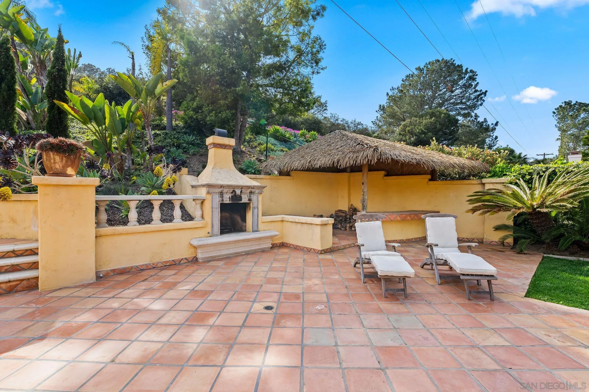 2969 Racetrack View Drive Del Mar, CA 92014 - Photo 39 of 59 a view of a chairs and table in patio with a fire pit