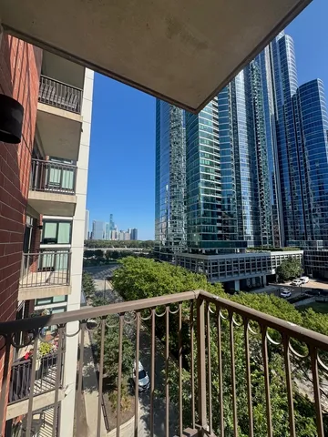 a view of balcony with furniture