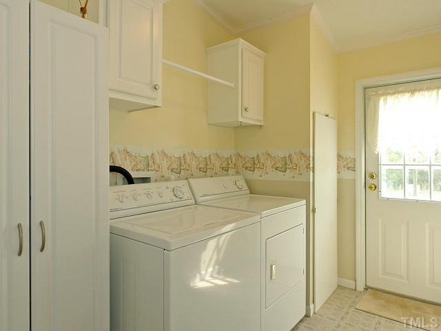 10829 Old Raleigh-Wilson Road Middlesex, NC 27557 - Photo 10 of 12 a utility room with dryer and washer