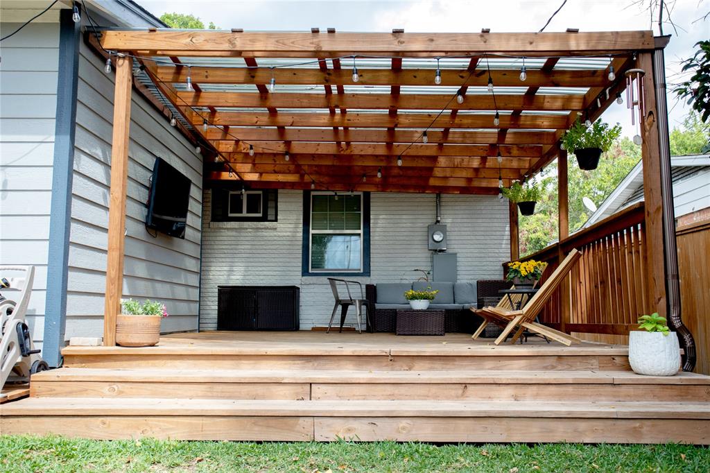 10879 Cassandra Way Dallas, TX 75228 - Photo 29 of 36 a view of house with a swimming pool