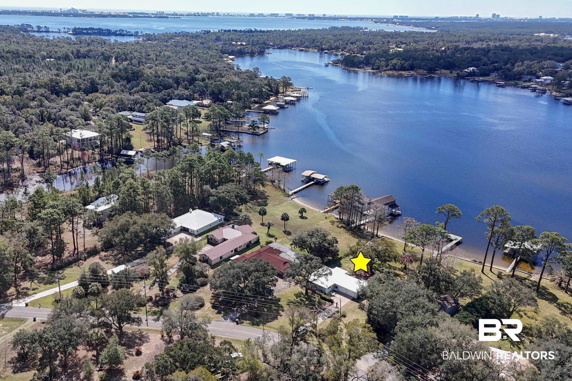 9459 Soldier Creek Road Lillian, AL 36549 - Photo 46 of 54 Drone / aerial view with a water view