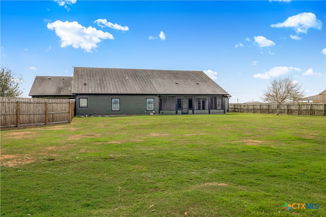 1118 East Maxwell Ditch Road Port Lavaca, TX 77979 - Photo 33 of 36 a view of a house with a big yard