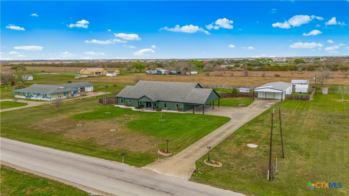 1118 East Maxwell Ditch Road Port Lavaca, TX 77979 - Photo 7 of 36 a view of a lake with a big yard