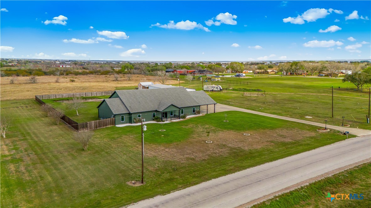 1118 East Maxwell Ditch Road Port Lavaca, TX 77979 - Photo 8 of 36 a view of a garden and an ocean