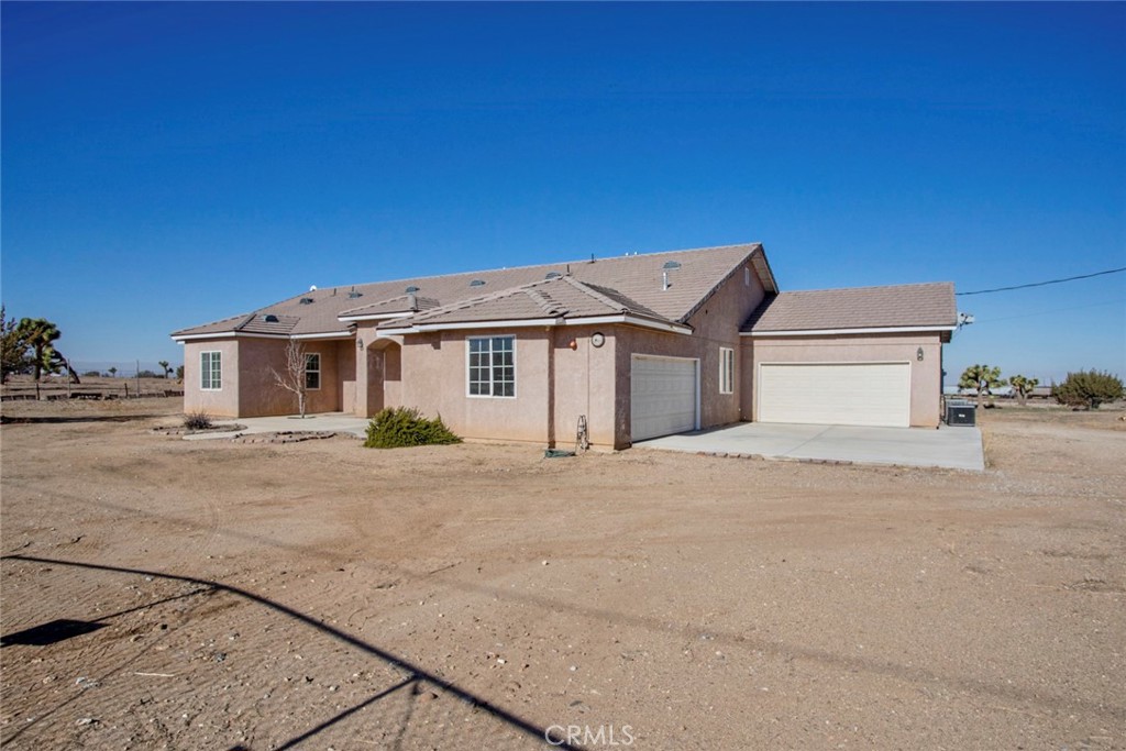 10730 Tumbleweed Road Phelan, CA 92371 - Photo 1 of 1 a view of a house with a street