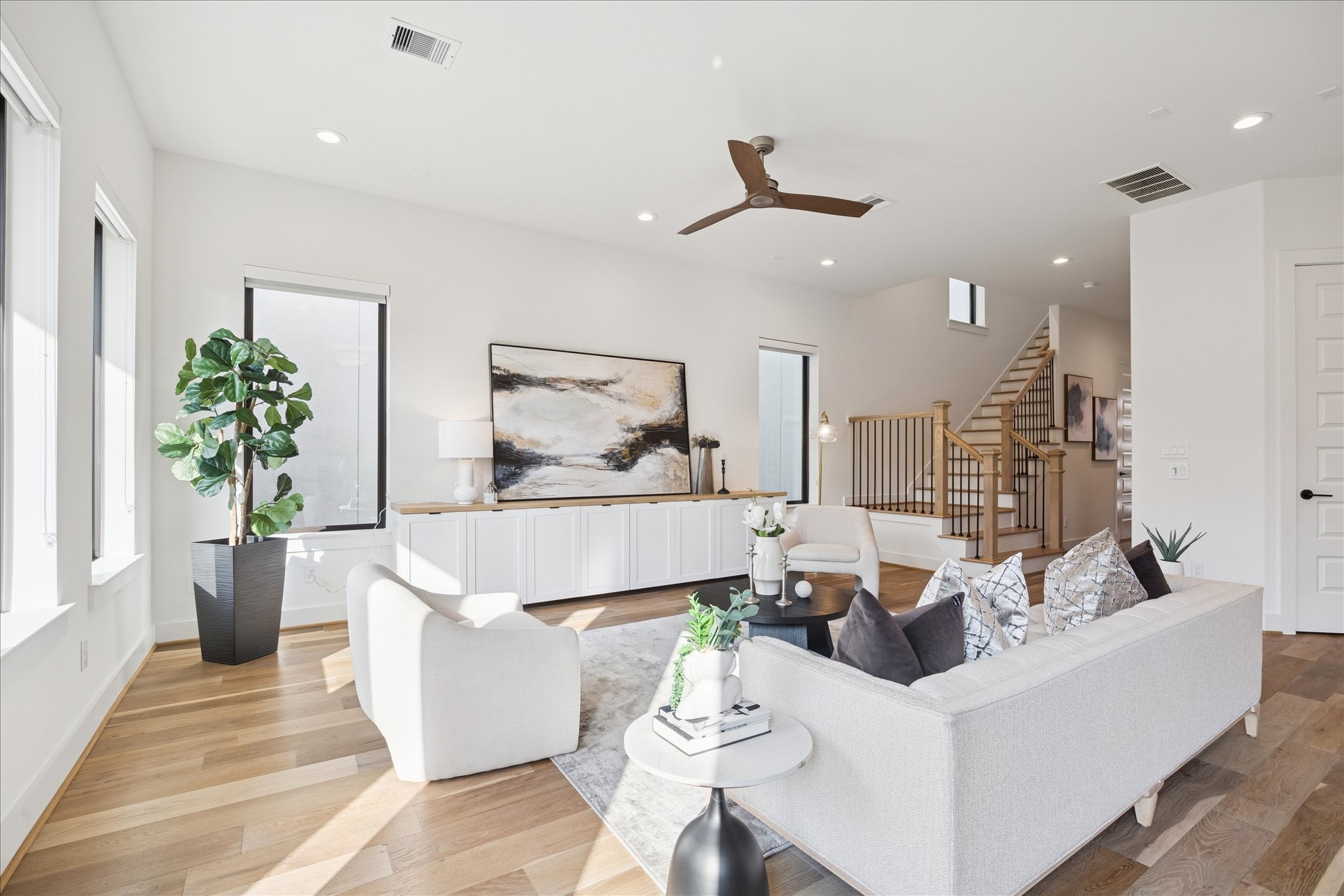 1739 Ojeman Point Lane Houston, TX 77055 - Photo 13 of 35 Custom built-in cabinetry surrounded by an abundance of windows, flooding the space with natural light.