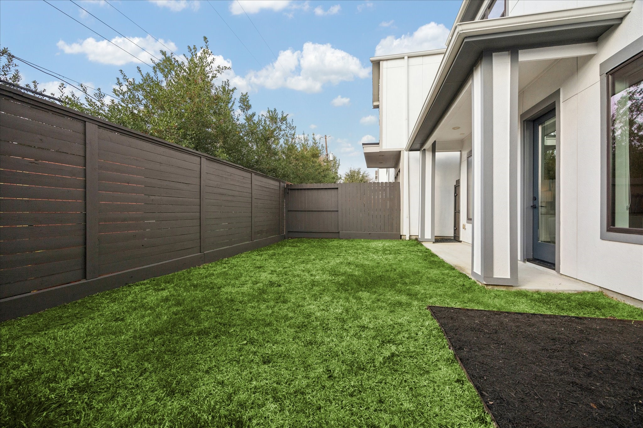 1739 Ojeman Point Lane Houston, TX 77055 - Photo 32 of 35 Enjoy a private backyard that backs to single-family homes, set on one of the larger lots in the community, complete with a freshly painted fence.