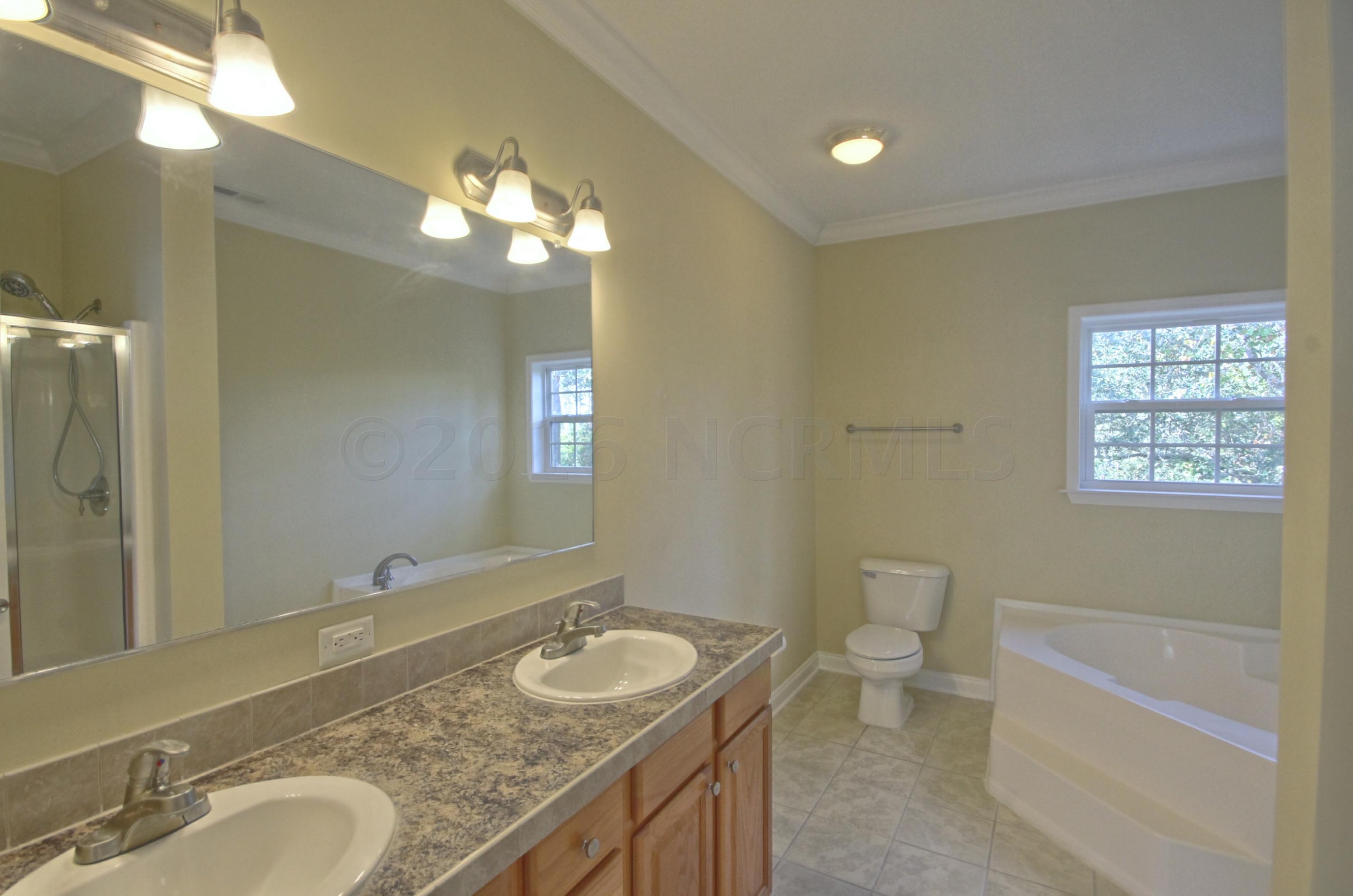 3502 Windy Point Road Southwest Supply, NC 28462 - Photo 14 of 29 Master bath