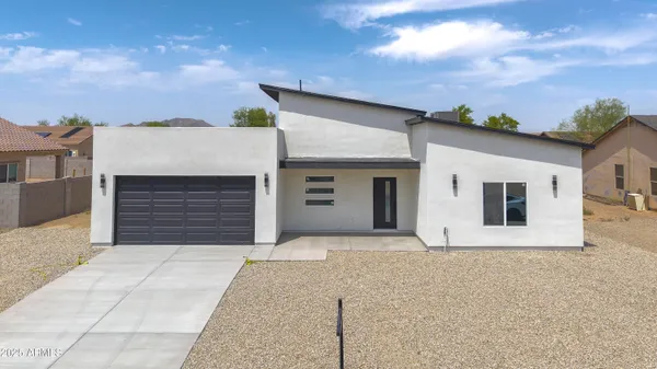 front view of a house with a garage