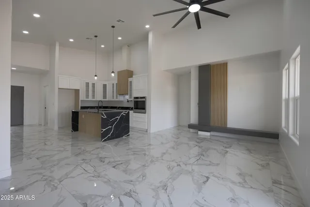 a view of kitchen with cabinets and outdoor space